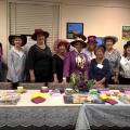 The Lacey Friends at their Mad Hatter Tea Table for Lacey’s 40th Anniversary